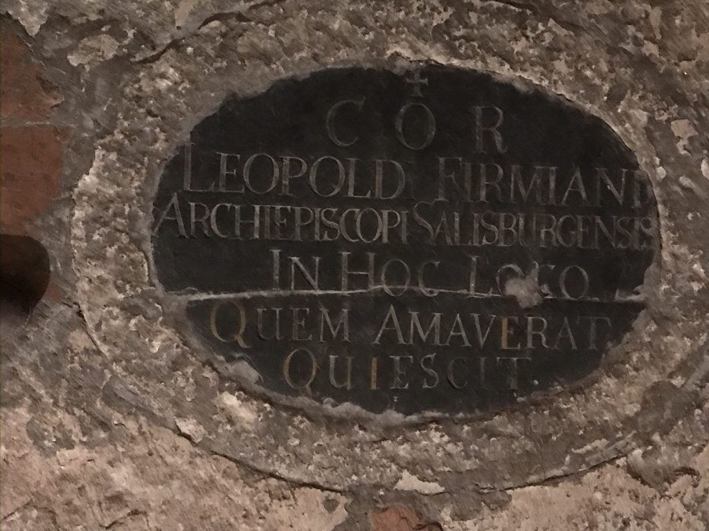 This plaque marks the spot where the bishop's heart was buried in the Schloss' chapel following his death.